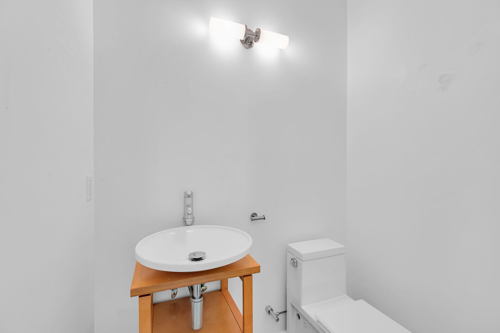 1501 Georgia Street Key West, FL 33040 - Photo 38 of 50 a bathroom with a toilet a sink and mirror