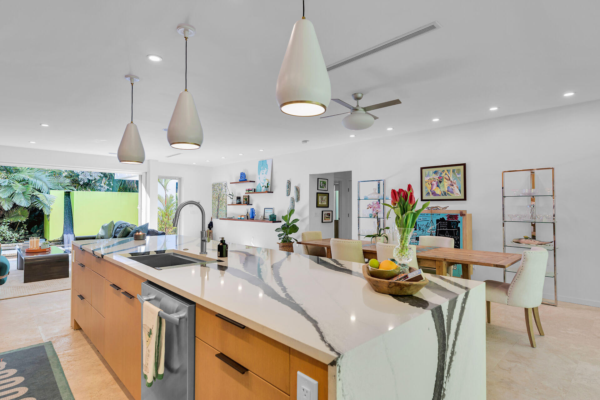1501 Georgia Street Key West, FL 33040 - Photo 48 of 50 a kitchen with stainless steel appliances kitchen island a large island in the center