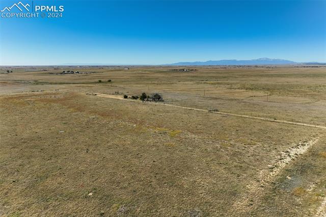 22309 Murphy Road Peyton, CO 80831 - Photo 9 of 16 Drone / aerial view featuring a mountain view