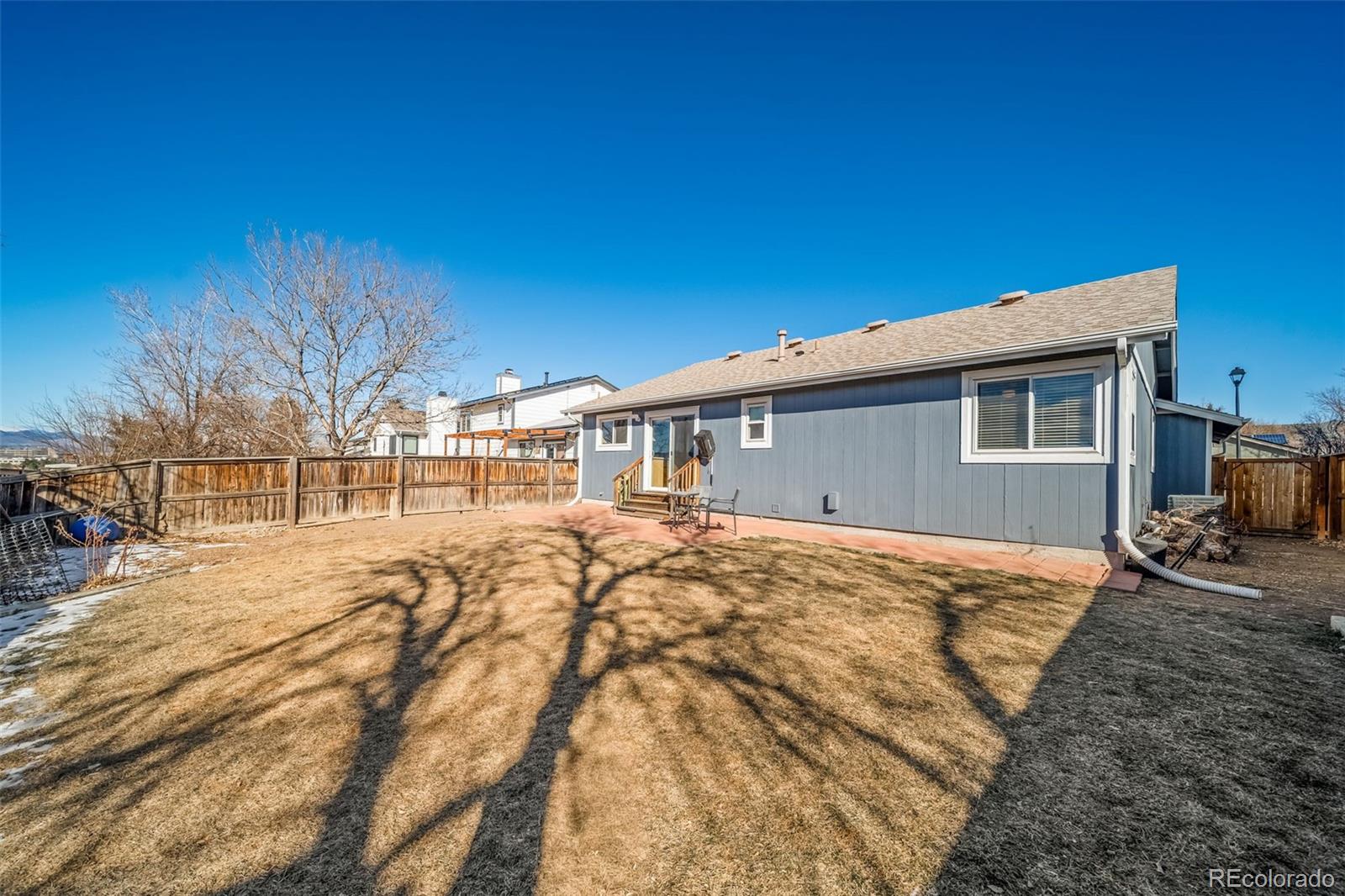 9240 Stargrass Circle Highlands Ranch, CO 80126 - Photo 44 of 46 a view of pool with yard