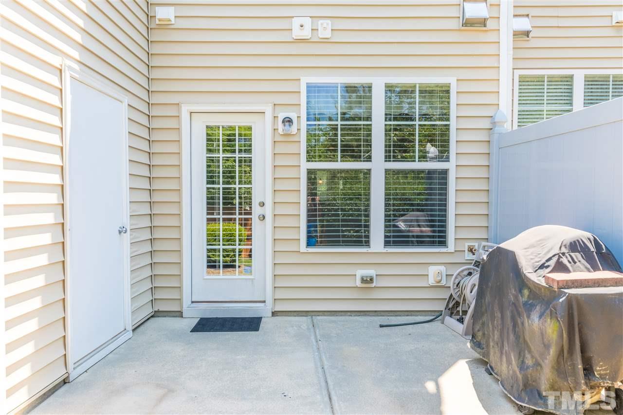 2960 Berkeley Springs Place Raleigh, NC 27616 - Photo 12 of 14 a living room with a couch and a window