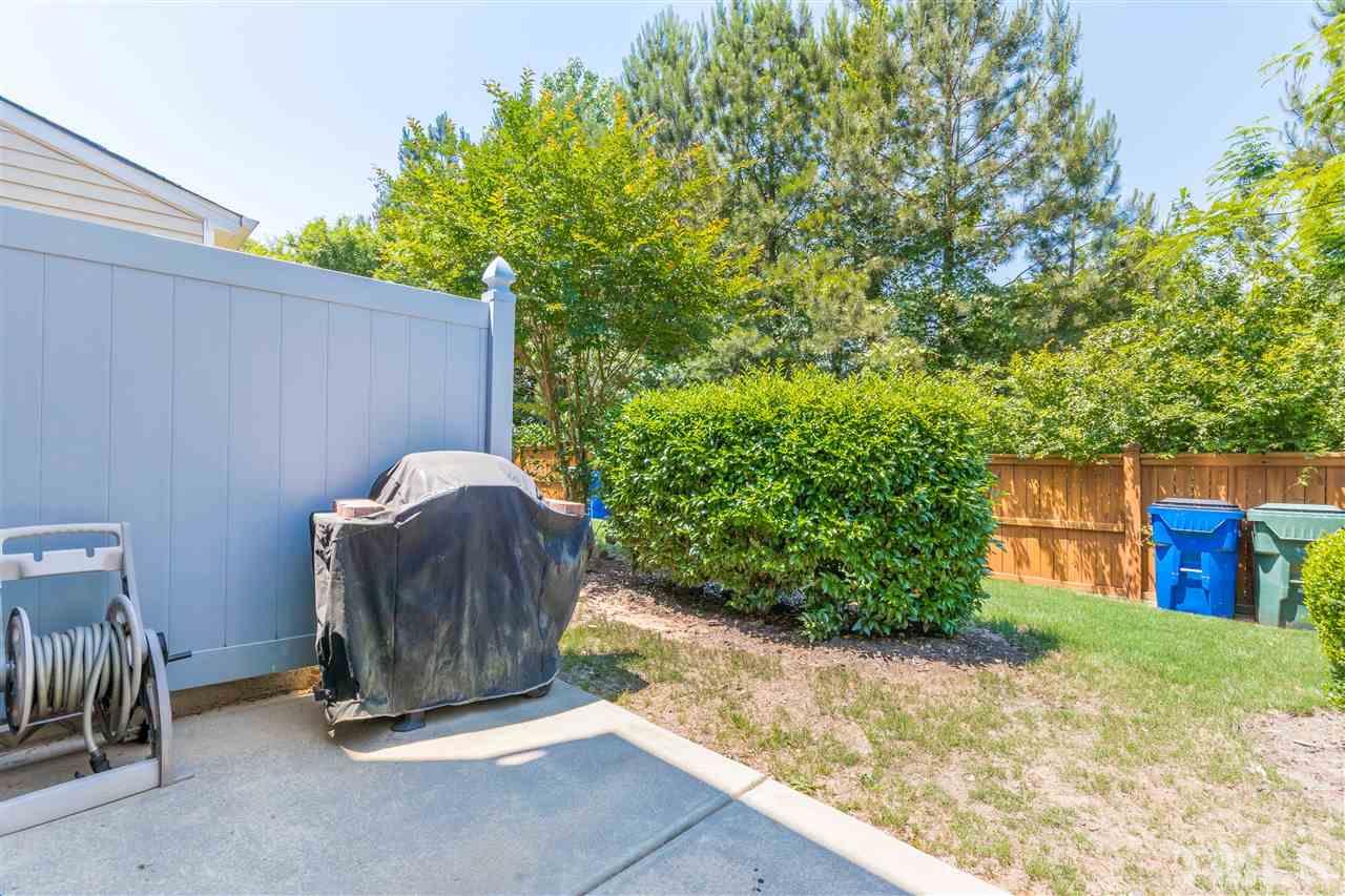 2960 Berkeley Springs Place Raleigh, NC 27616 - Photo 13 of 14 a view of a backyard