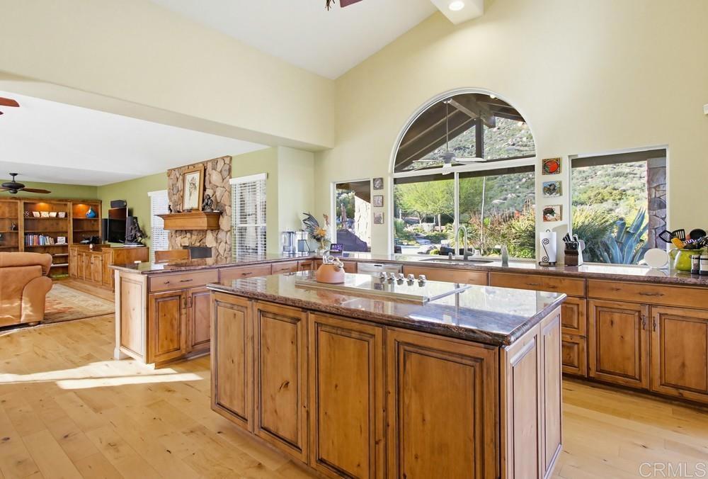 3930 Via Palo Verde Lago Alpine, CA 91901 - Photo 32 of 75 a kitchen with stainless steel appliances granite countertop a sink and cabinets