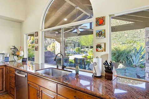 a view of a terrace with furniture