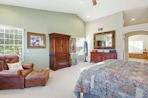 a view of a swimming pool with a lawn chairs