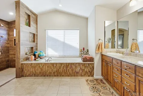 a view of a lake with couches and city view