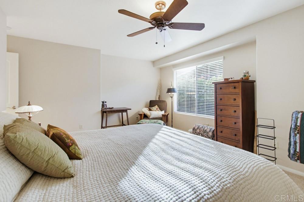 3930 Via Palo Verde Lago Alpine, CA 91901 - Photo 47 of 75 a bedroom with a bed and wooden floor