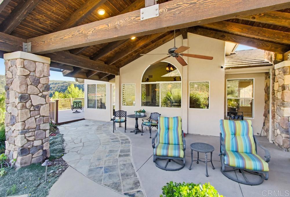 3930 Via Palo Verde Lago Alpine, CA 91901 - Photo 56 of 75 a view of a porch with furniture and a yard