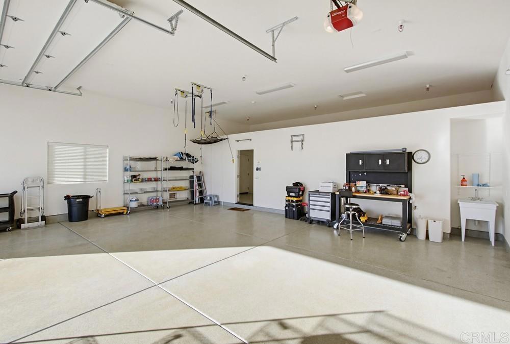 3930 Via Palo Verde Lago Alpine, CA 91901 - Photo 63 of 75 a living room with furniture and a flat screen tv