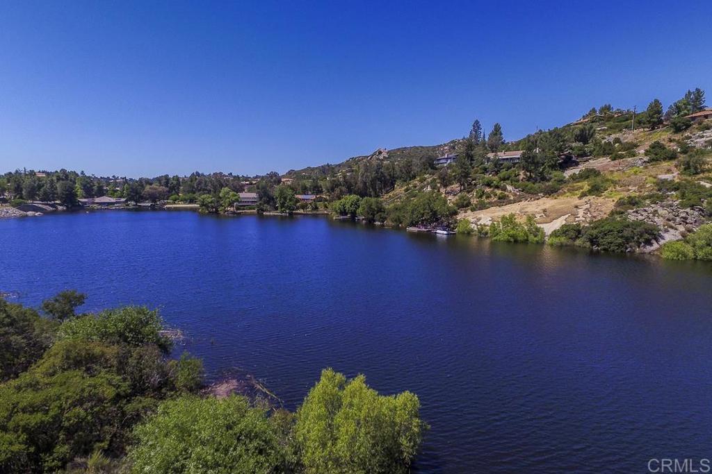 3930 Via Palo Verde Lago Alpine, CA 91901 - Photo 72 of 75 front view of a house with a lake view