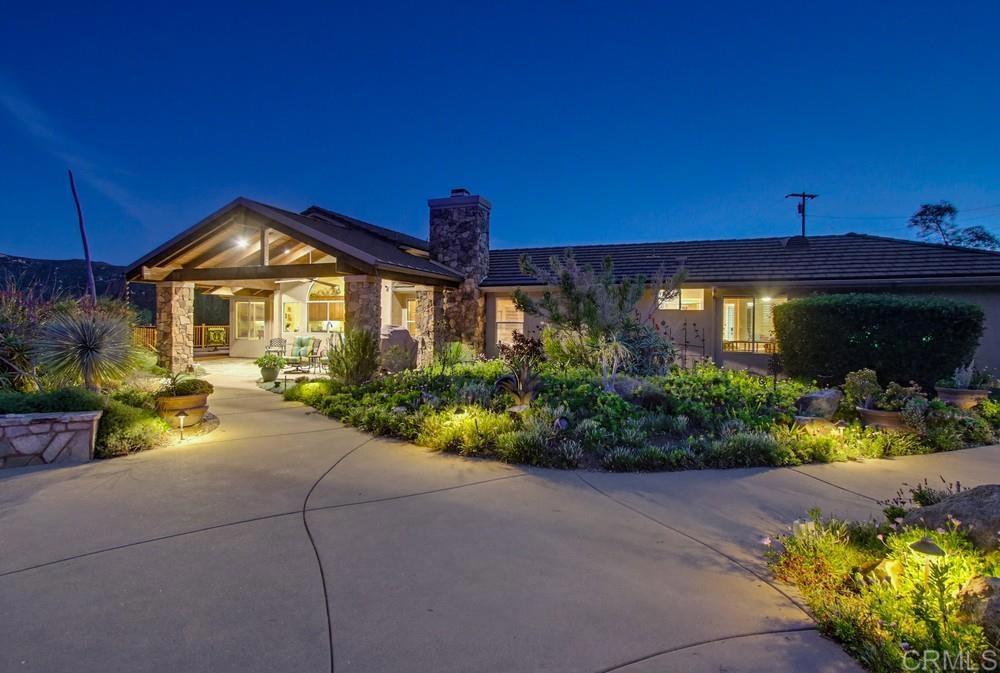 3930 Via Palo Verde Lago Alpine, CA 91901 - Photo 8 of 75 a front view of a house with a yard