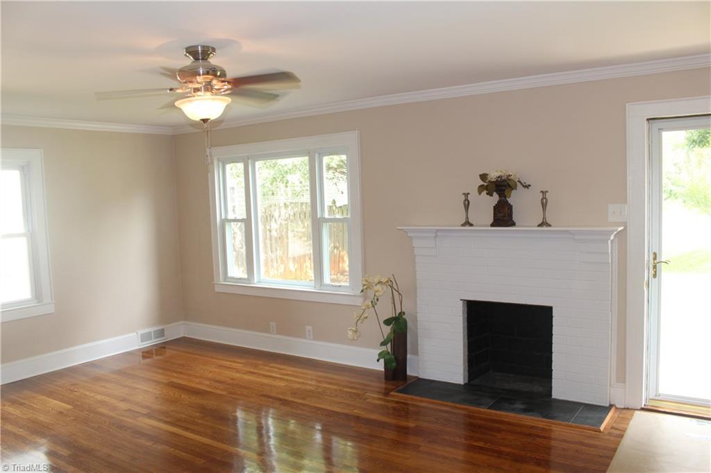 5650 Reynolda Road Winston-Salem, NC 27106 - Photo 1 of 21 Living Room with lots of windows to catch light in all seasons