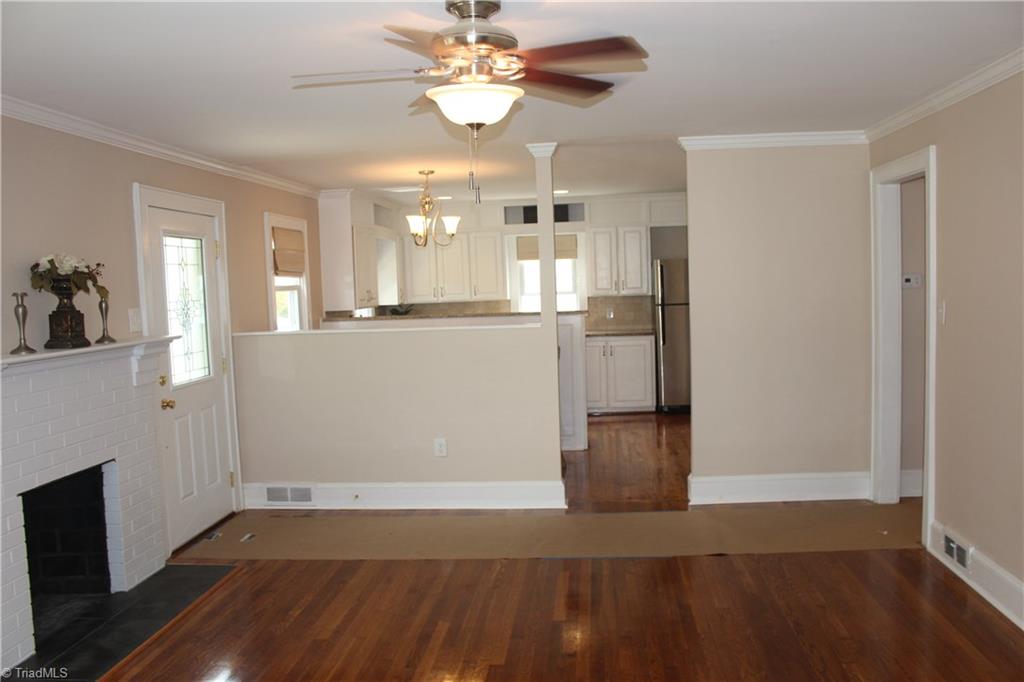 5650 Reynolda Road Winston-Salem, NC 27106 - Photo 4 of 21 Living room opens to kitchen and dining area