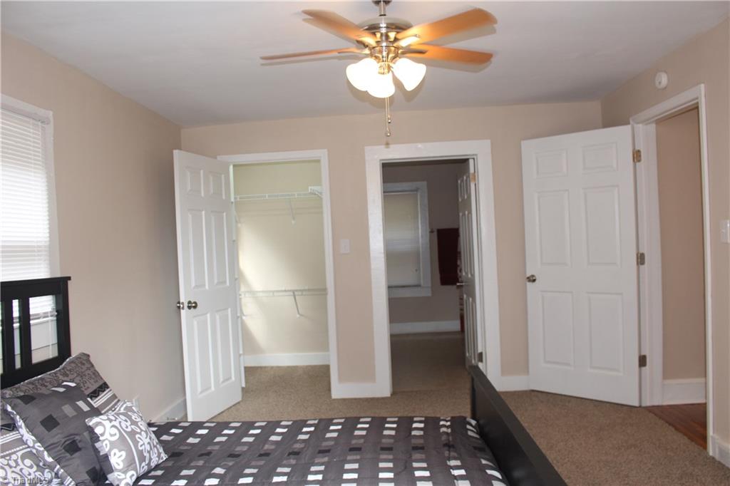 5650 Reynolda Road Winston-Salem, NC 27106 - Photo 6 of 21 Master Bedroom with walk in closet and its own bath.