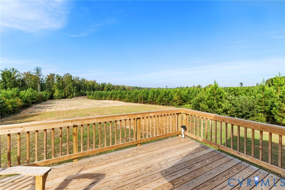 77 Jenkins Church Road Cumberland, VA 23040 - Photo 28 of 46 a view of a balcony with wooden floor and fence