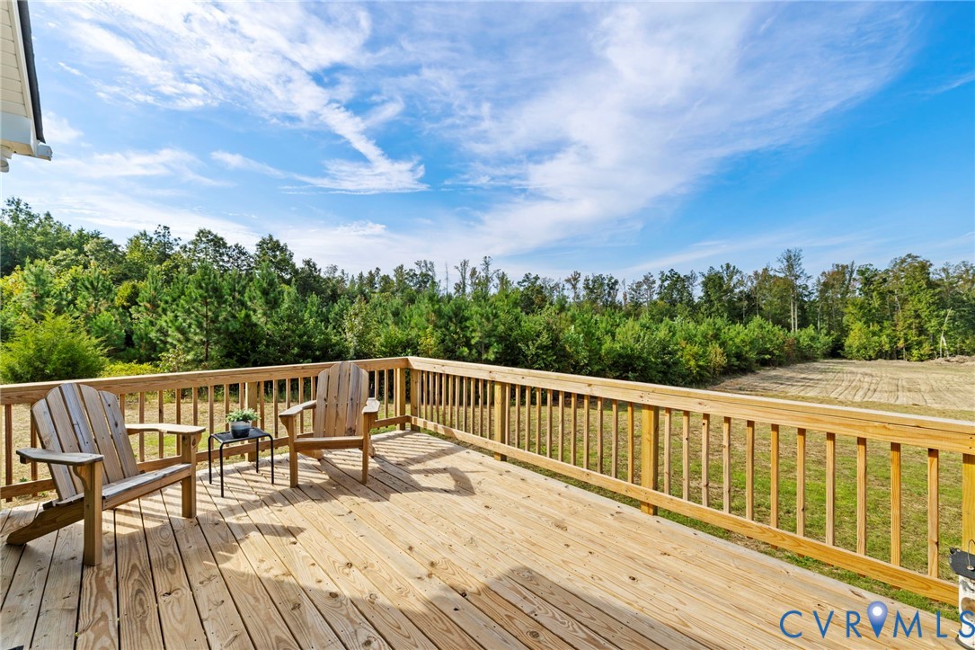 77 Jenkins Church Road Cumberland, VA 23040 - Photo 29 of 46 a view of balcony with wooden floor and fence