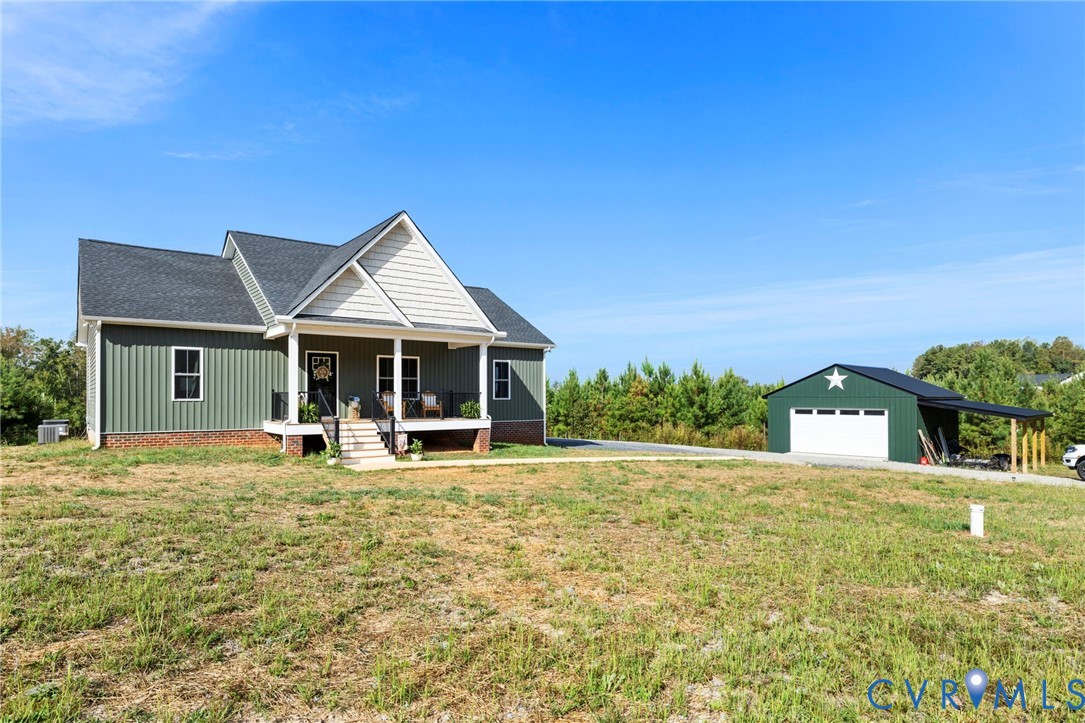 77 Jenkins Church Road Cumberland, VA 23040 - Photo 3 of 46 a front view of a house with a yard