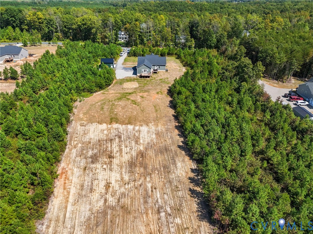 77 Jenkins Church Road Cumberland, VA 23040 - Photo 44 of 46 a aerial view of a house with a yard and garden