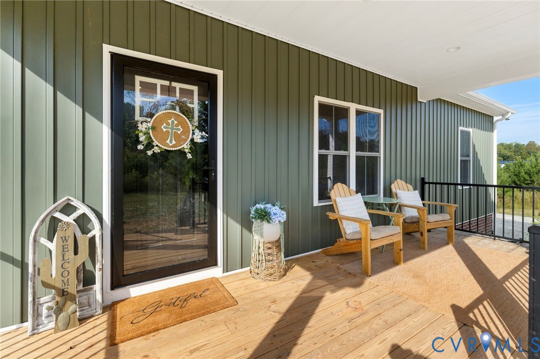 77 Jenkins Church Road Cumberland, VA 23040 - Photo 8 of 46 a outdoor space with a large mirror and a large window
