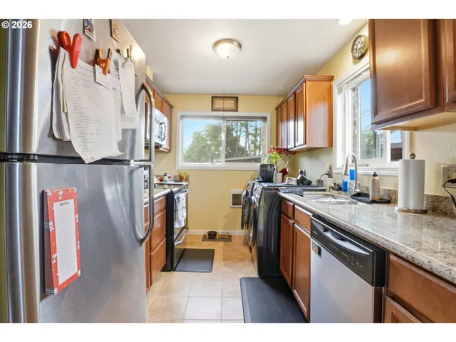 a bathroom with a sink vanity and a mirror