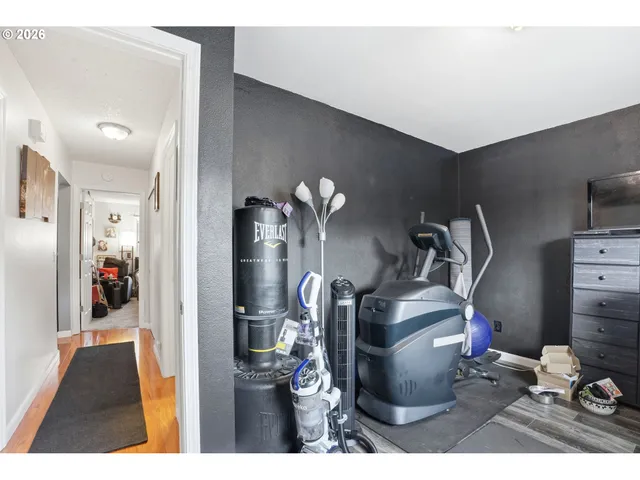 a work room with furniture and a window