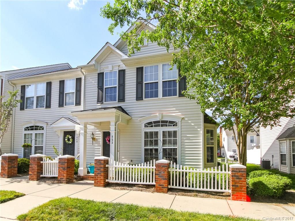 853 Dillard Road, Unit 103 Rock Hill, SC 29730 - Photo 1 of 18 a front view of a house with a garden