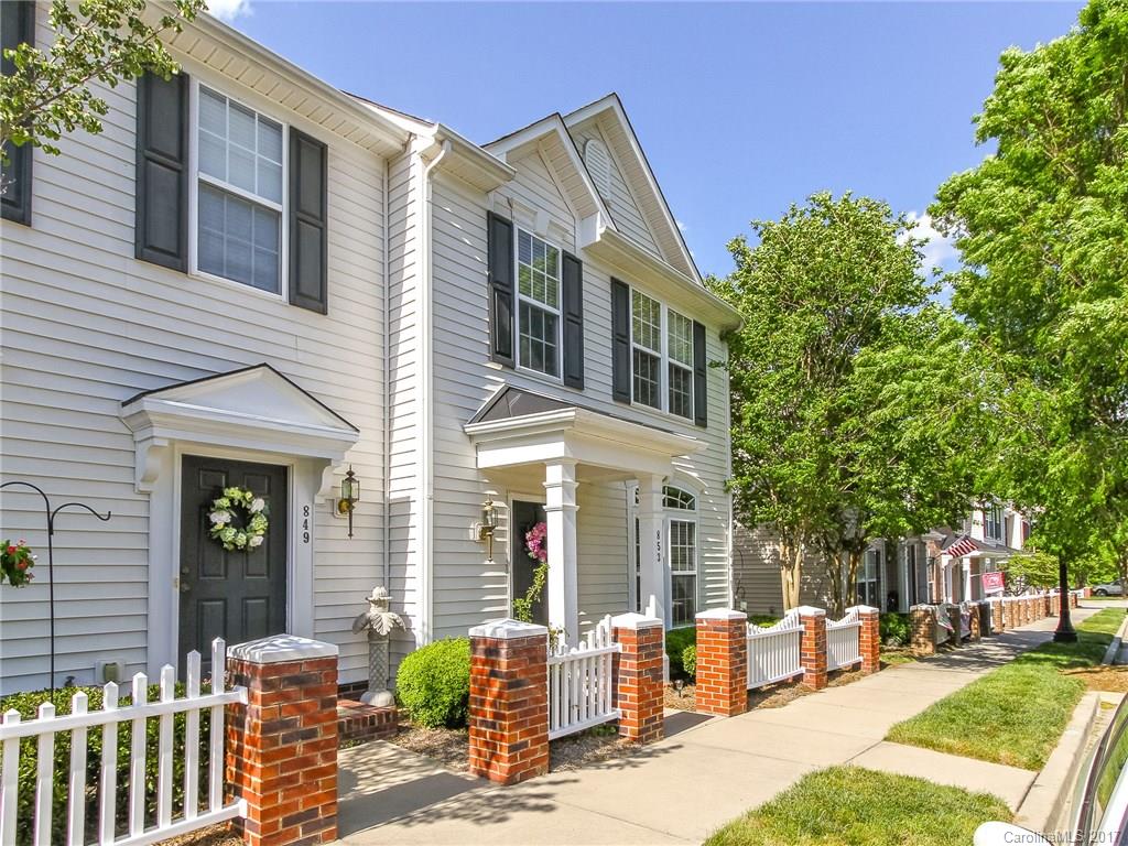 853 Dillard Road, Unit 103 Rock Hill, SC 29730 - Photo 2 of 18 a front view of a house with outdoor seating