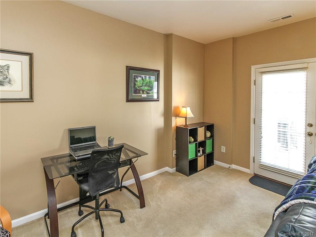 853 Dillard Road, Unit 103 Rock Hill, SC 29730 - Photo 12 of 18 a view of a workspace with furniture and a window