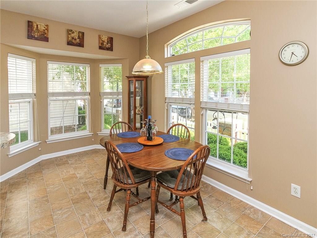 853 Dillard Road, Unit 103 Rock Hill, SC 29730 - Photo 3 of 18 a dining room with furniture and a window