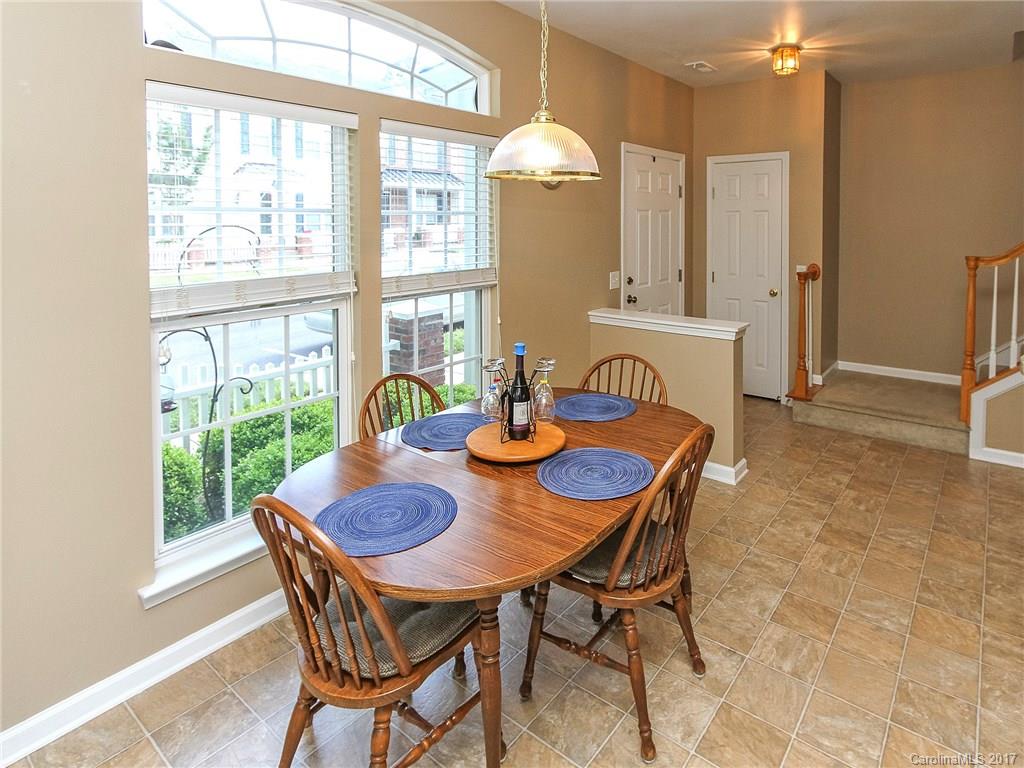 853 Dillard Road, Unit 103 Rock Hill, SC 29730 - Photo 4 of 18 a view of a dining room with furniture and window