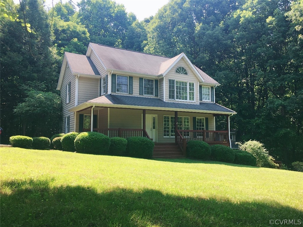 312 Sunset Ridge Drive Farmville, VA 23901 - Photo 1 of 25 a front view of a house with a yard and garage