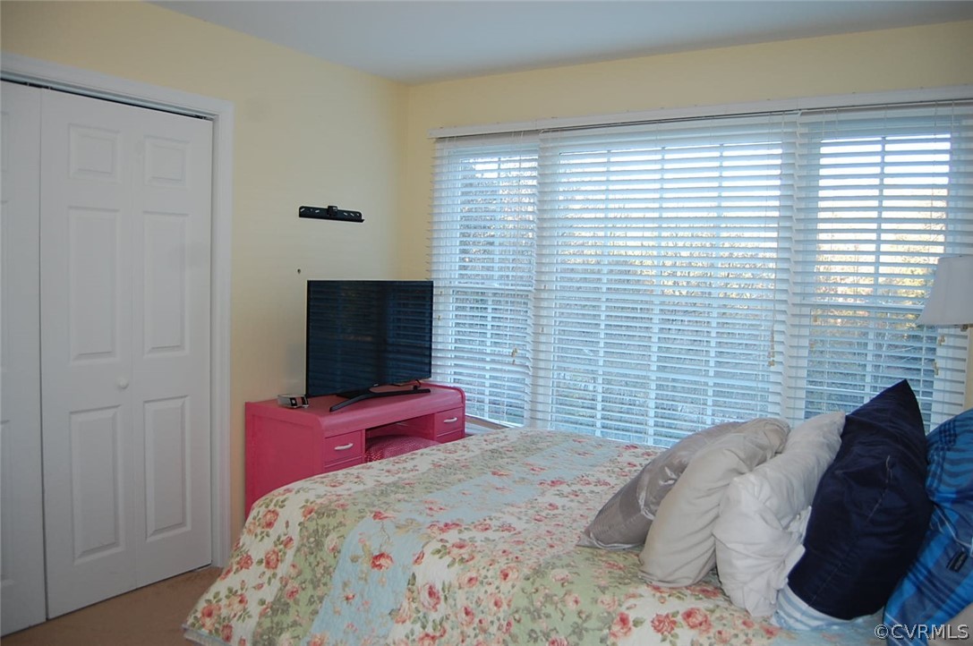 312 Sunset Ridge Drive Farmville, VA 23901 - Photo 17 of 25 a bedroom with a bed and a window