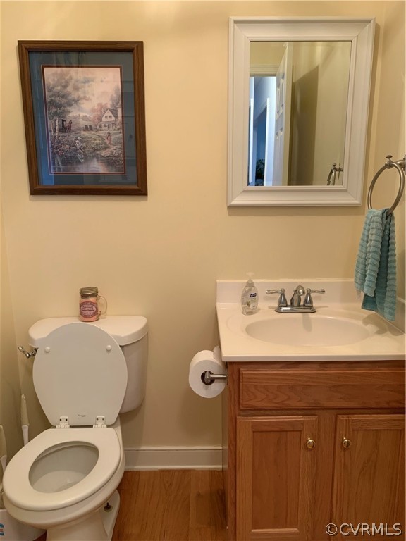 312 Sunset Ridge Drive Farmville, VA 23901 - Photo 24 of 25 a bathroom with a toilet sink and mirror