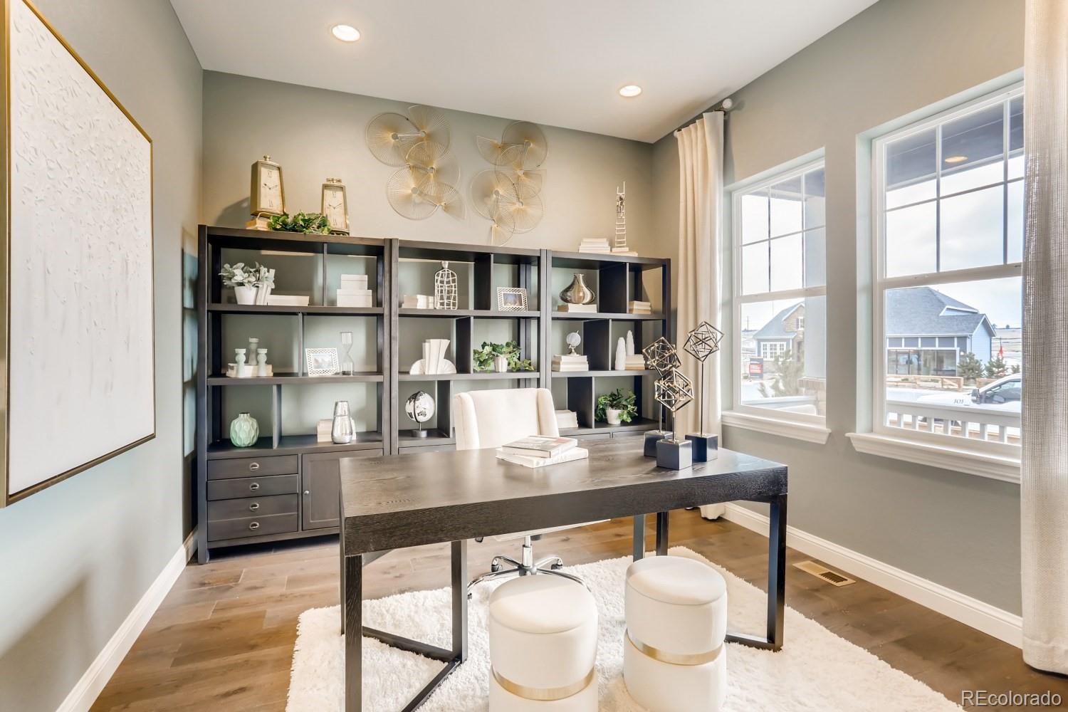 3008 Blithe Point Castle Rock, CO 80108 - Photo 12 of 29 a room with a table and chairs