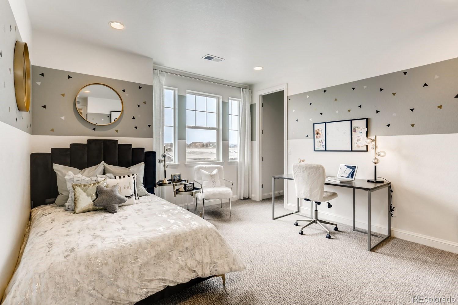 3008 Blithe Point Castle Rock, CO 80108 - Photo 20 of 29 a bedroom with bed and a window
