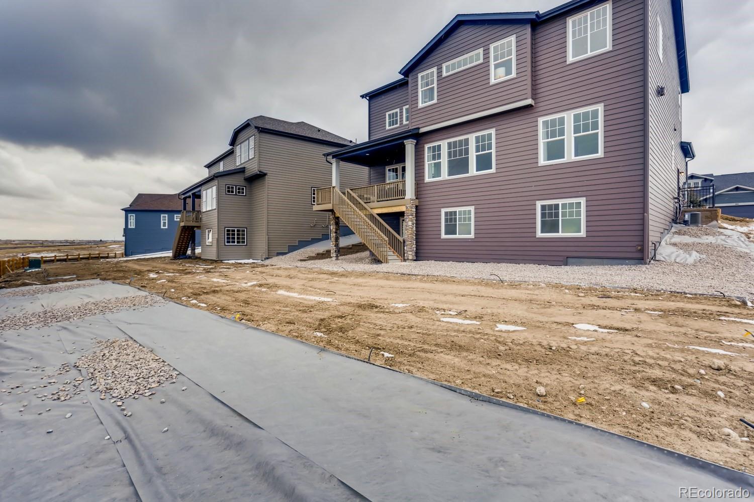 3008 Blithe Point Castle Rock, CO 80108 - Photo 28 of 29 a view of a house with a backyard