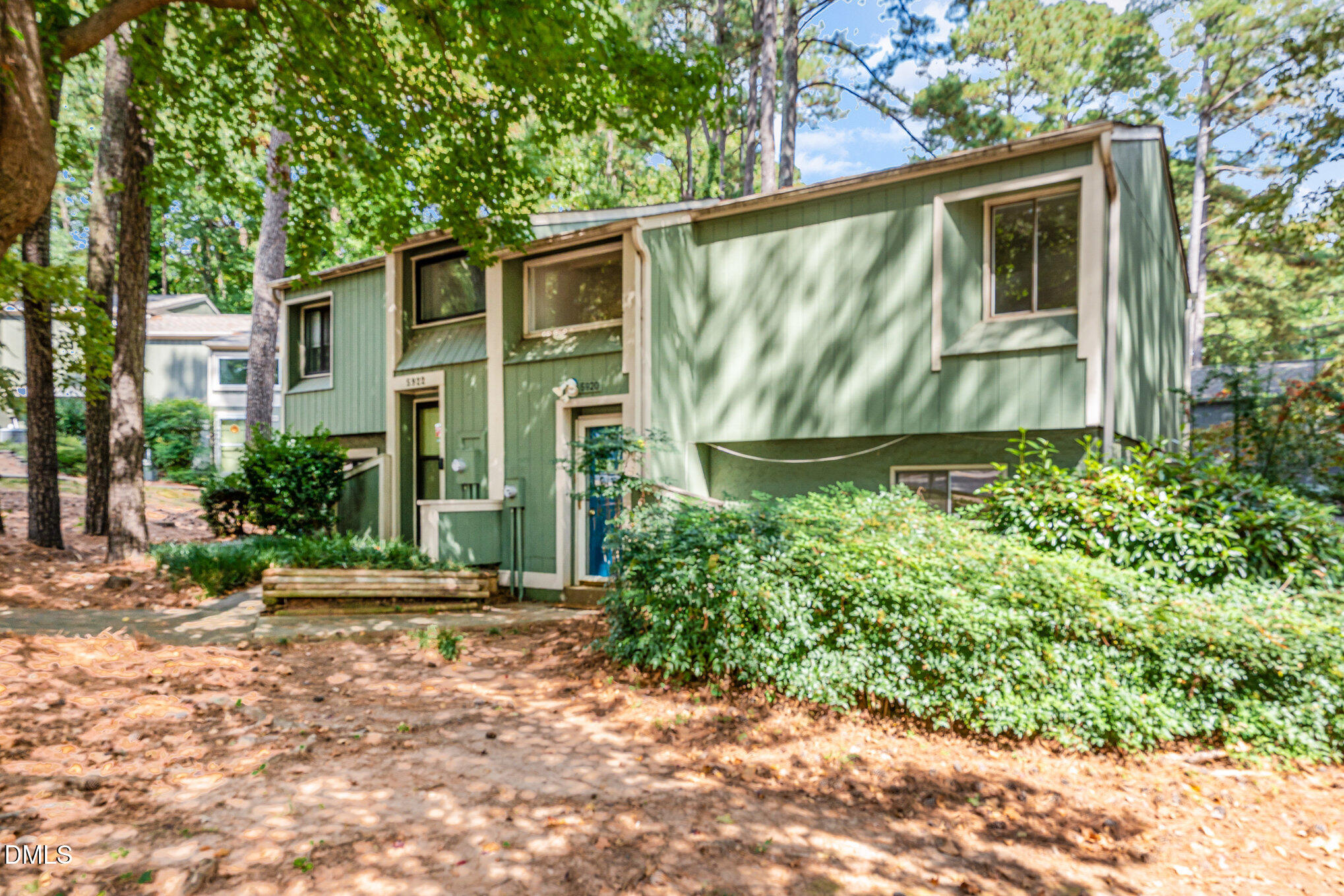5920 Farm Gate Road Raleigh, NC 27606 - Photo 2 of 16 a view of a house with a yard