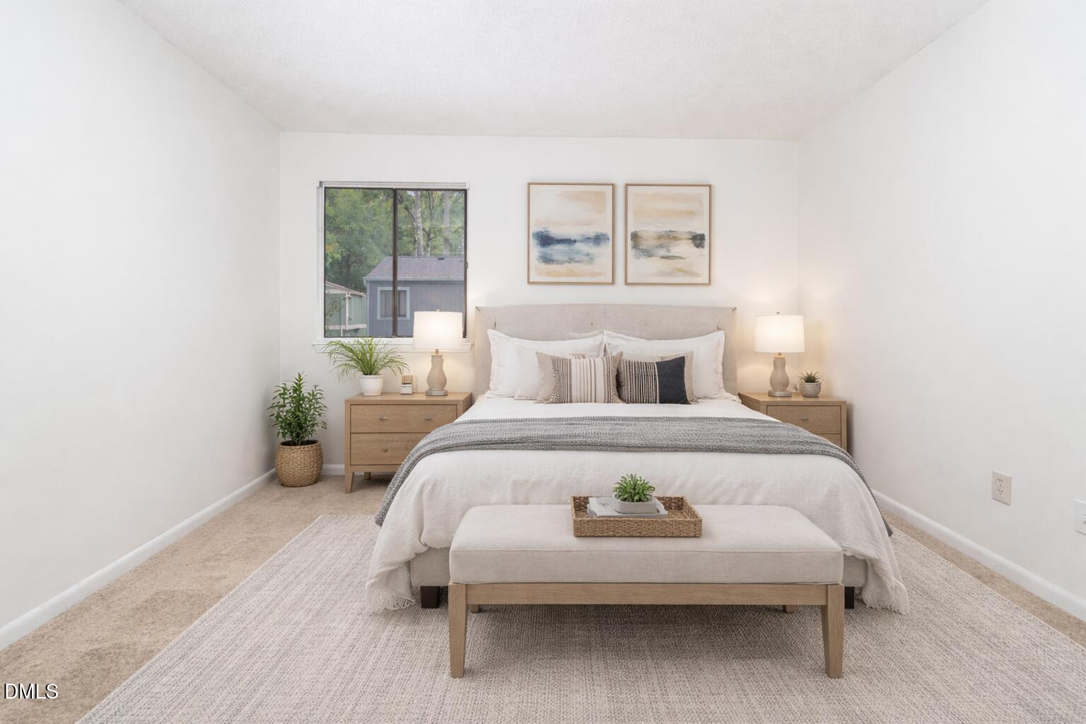 5920 Farm Gate Road Raleigh, NC 27606 - Photo 8 of 16 a bedroom with a bed and a window