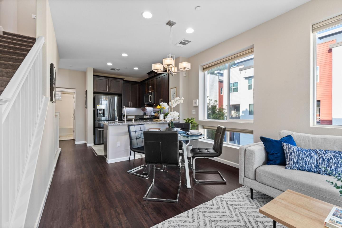 402 Ellicott Loop San Jose, CA 95123 - Photo 15 of 33 a view of a dining room with furniture window and wooden floor