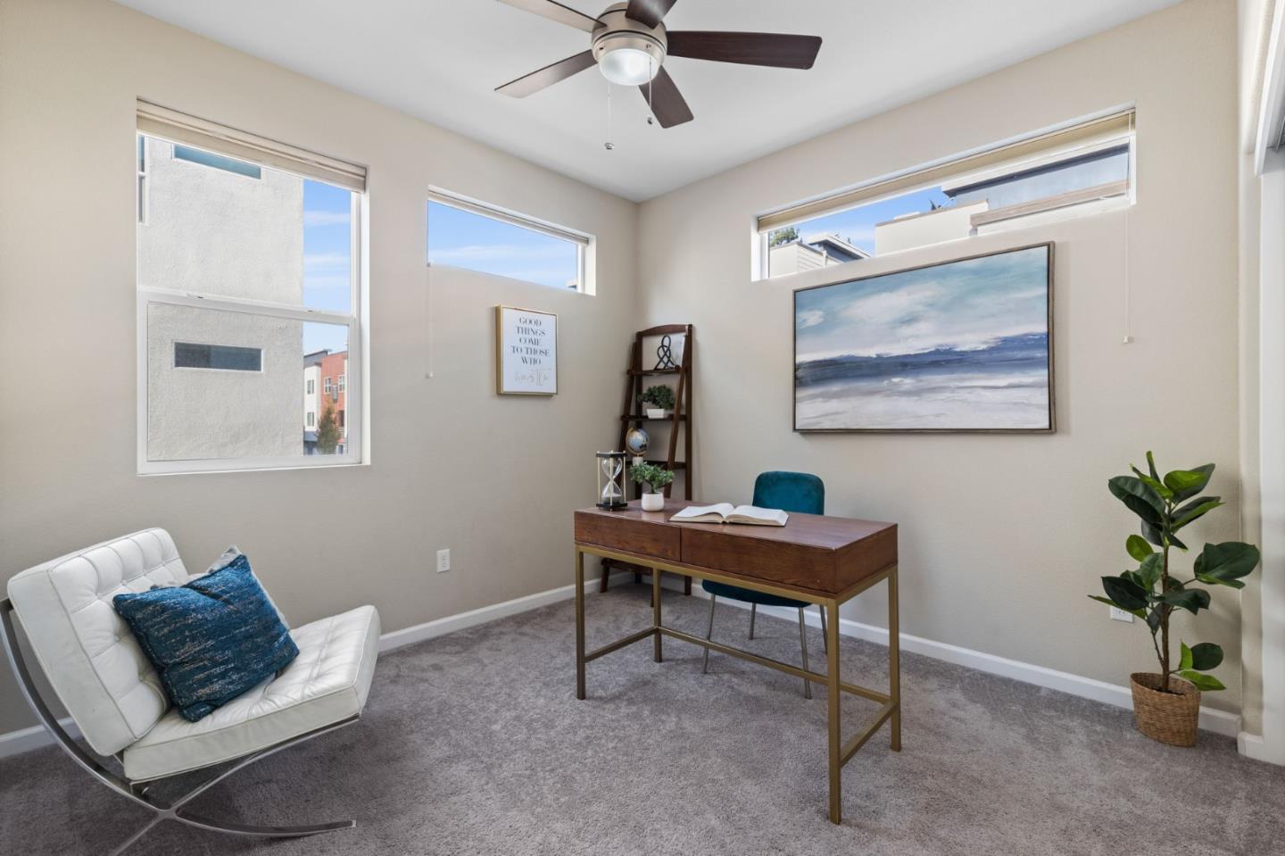 402 Ellicott Loop San Jose, CA 95123 - Photo 16 of 33 a room with furniture and a potted plant