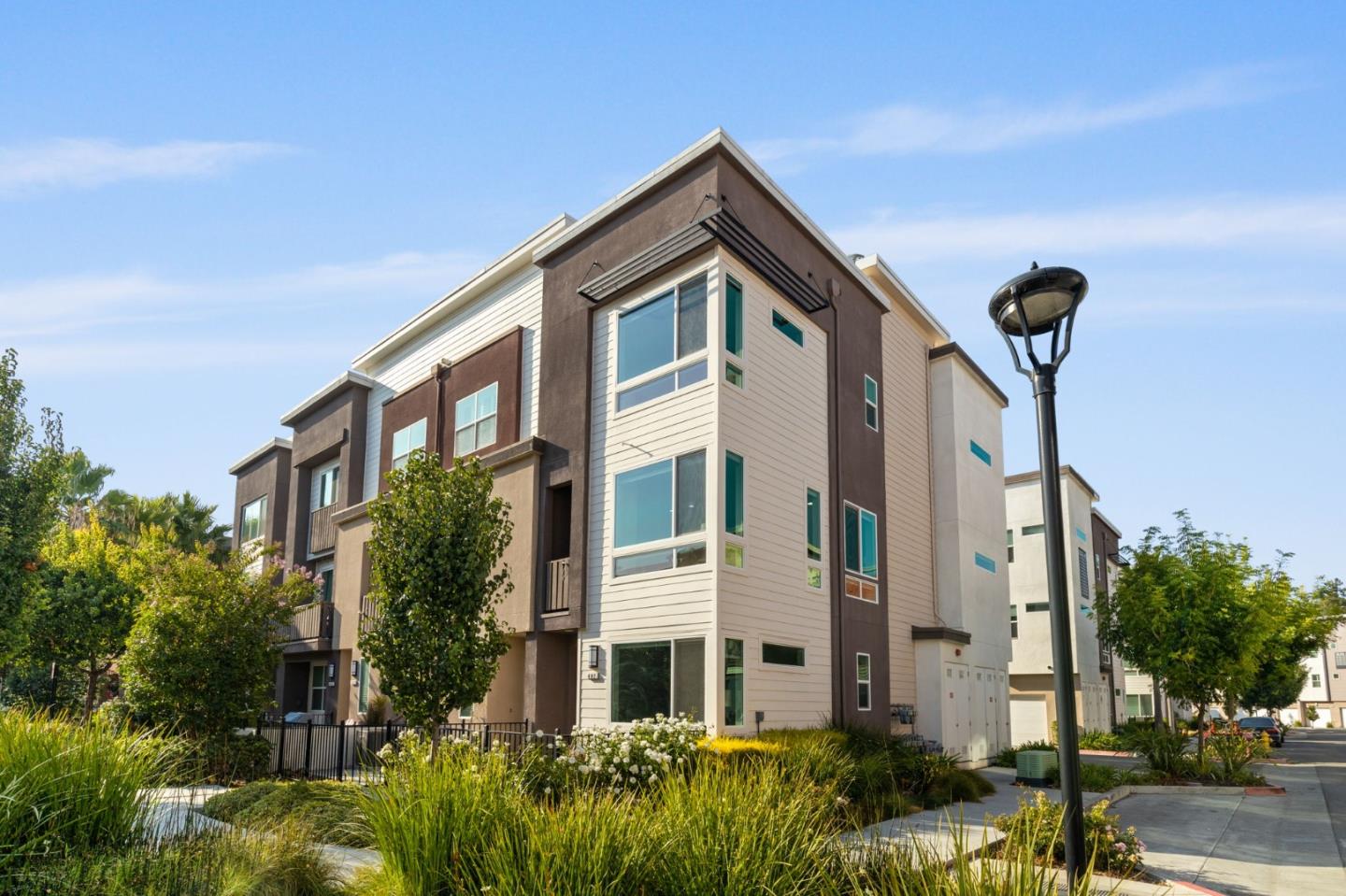 402 Ellicott Loop San Jose, CA 95123 - Photo 27 of 33 a front view of a house with a yard