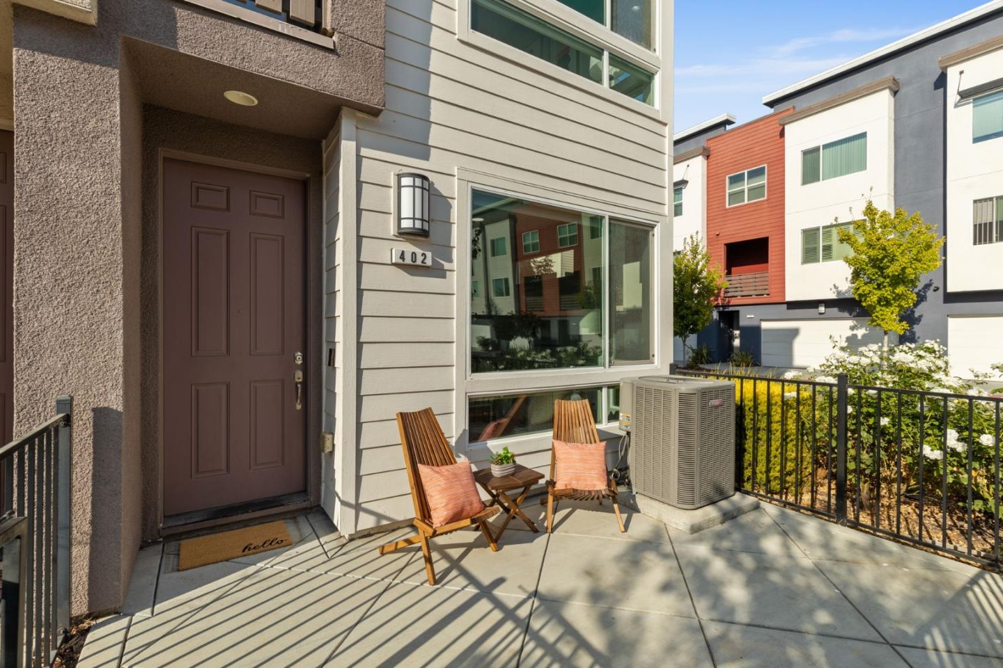 402 Ellicott Loop San Jose, CA 95123 - Photo 29 of 33 a view of a patio with table and chairs and wooden fence