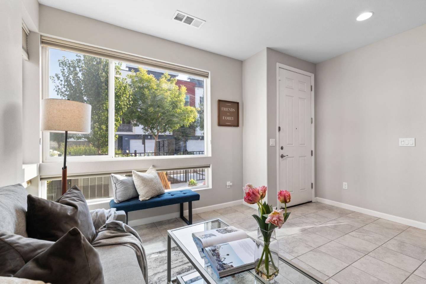 402 Ellicott Loop San Jose, CA 95123 - Photo 6 of 33 a living room with furniture and a large window