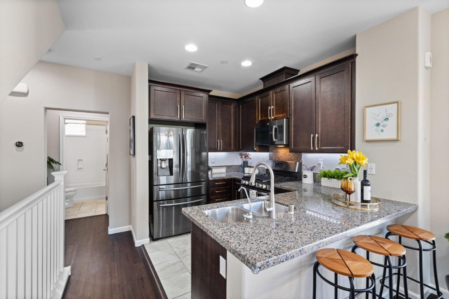 402 Ellicott Loop San Jose, CA 95123 - Photo 10 of 33 a kitchen with granite countertop lots of counter top space