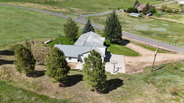 9029 North Treasureton Road Preston, ID 83263 - Photo 26 of 31 Spacious property with a light-colored exterior and a metal roof