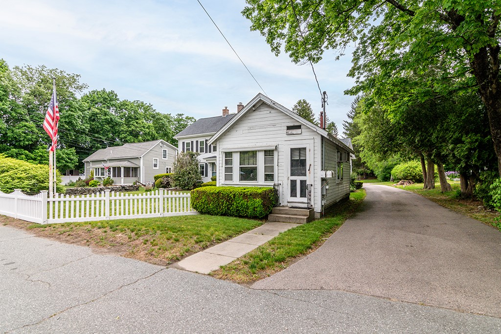 385 Ten Rod Road North Kingstown, RI 02852 - Photo 2 of 36 Barber shop view with driveway to spacious back yard and 3 car garage