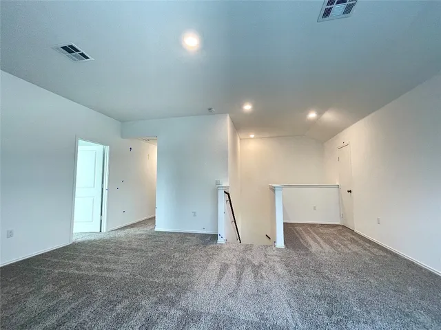 a view of empty room with a window