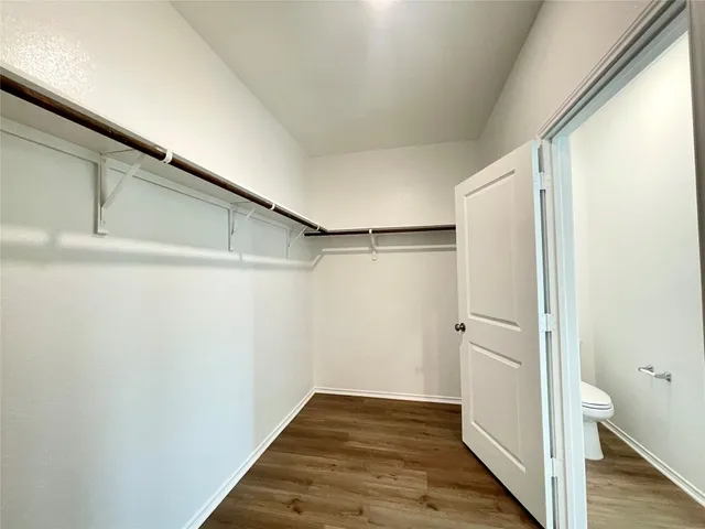 a en suite bathroom with a sink and a mirror