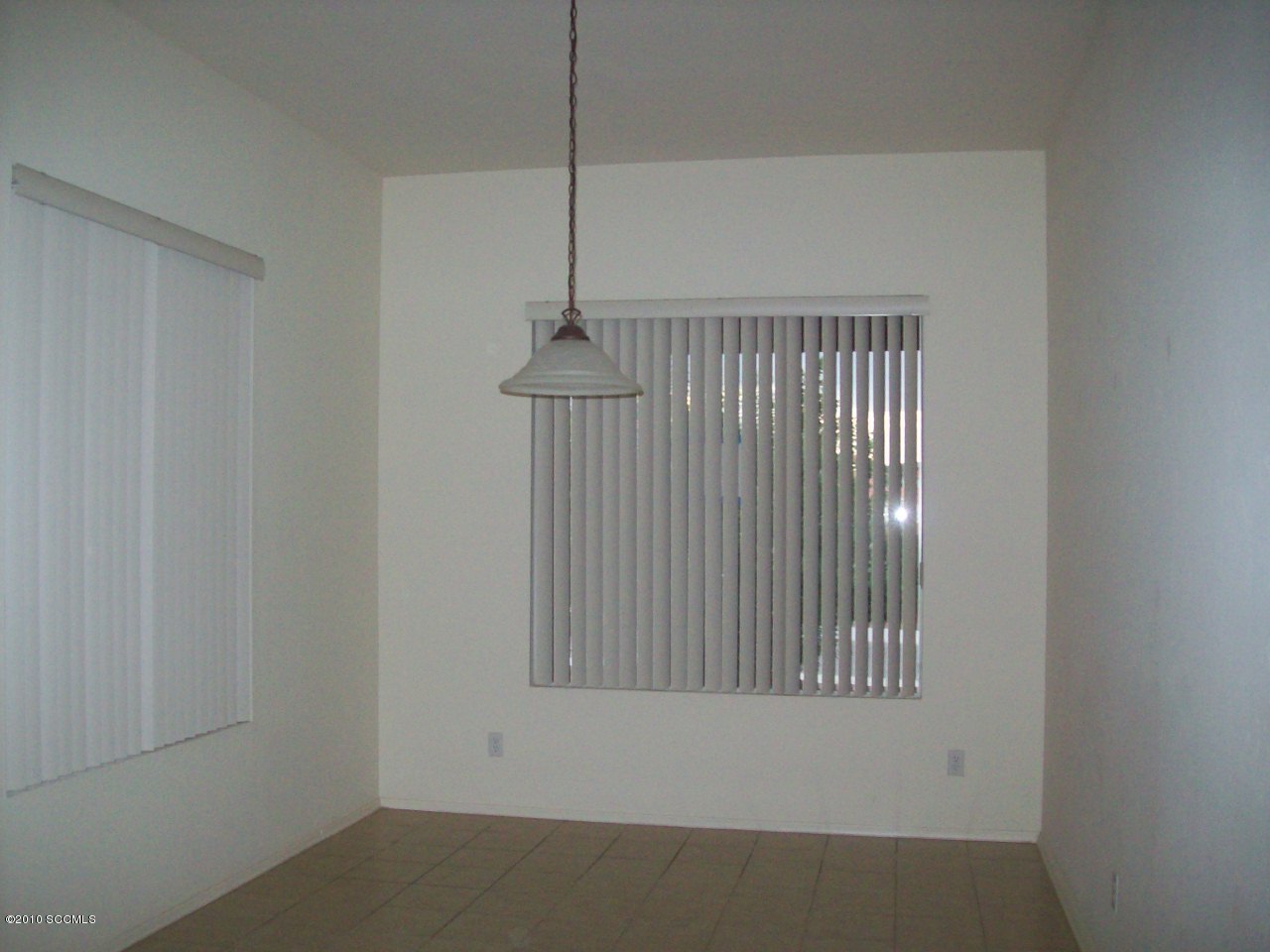 313 Via Bella Donna Rio Rico, AZ 85648 - Photo 2 of 7 a view of an empty room with a window