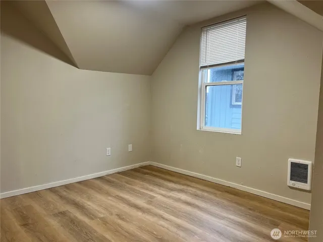 a house view with a backyard space